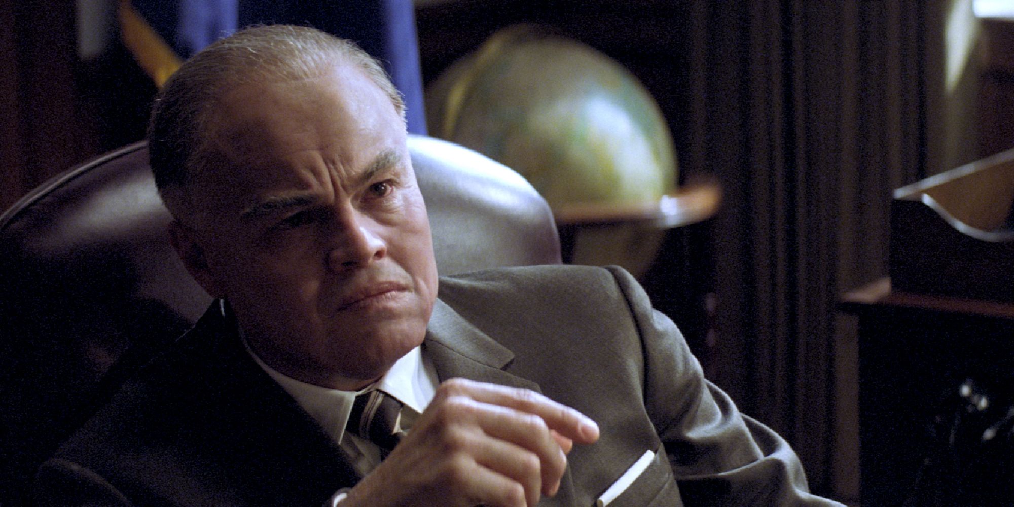 Leonardo DiCaprio wearing old age makeup to portray J. Edgar Hoover