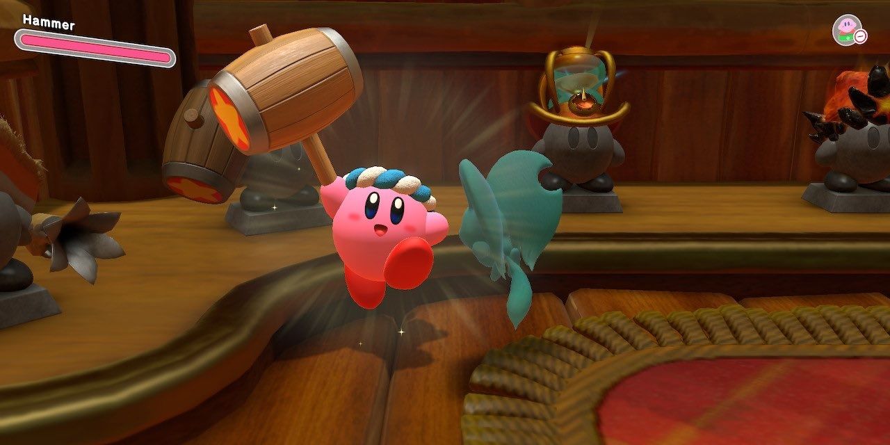 Equipping the hammer in Kirby and the Forgotten Land