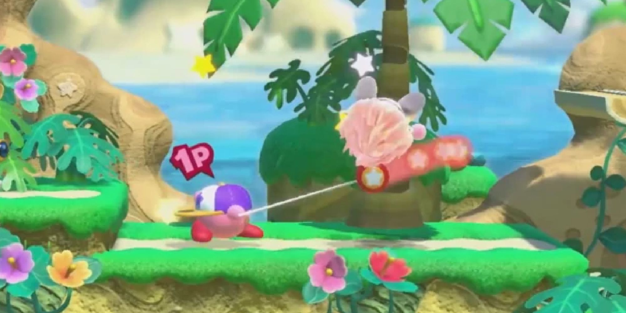 Kirby hitting a fire enemy with a Yo-yo in Kirby Star Allies