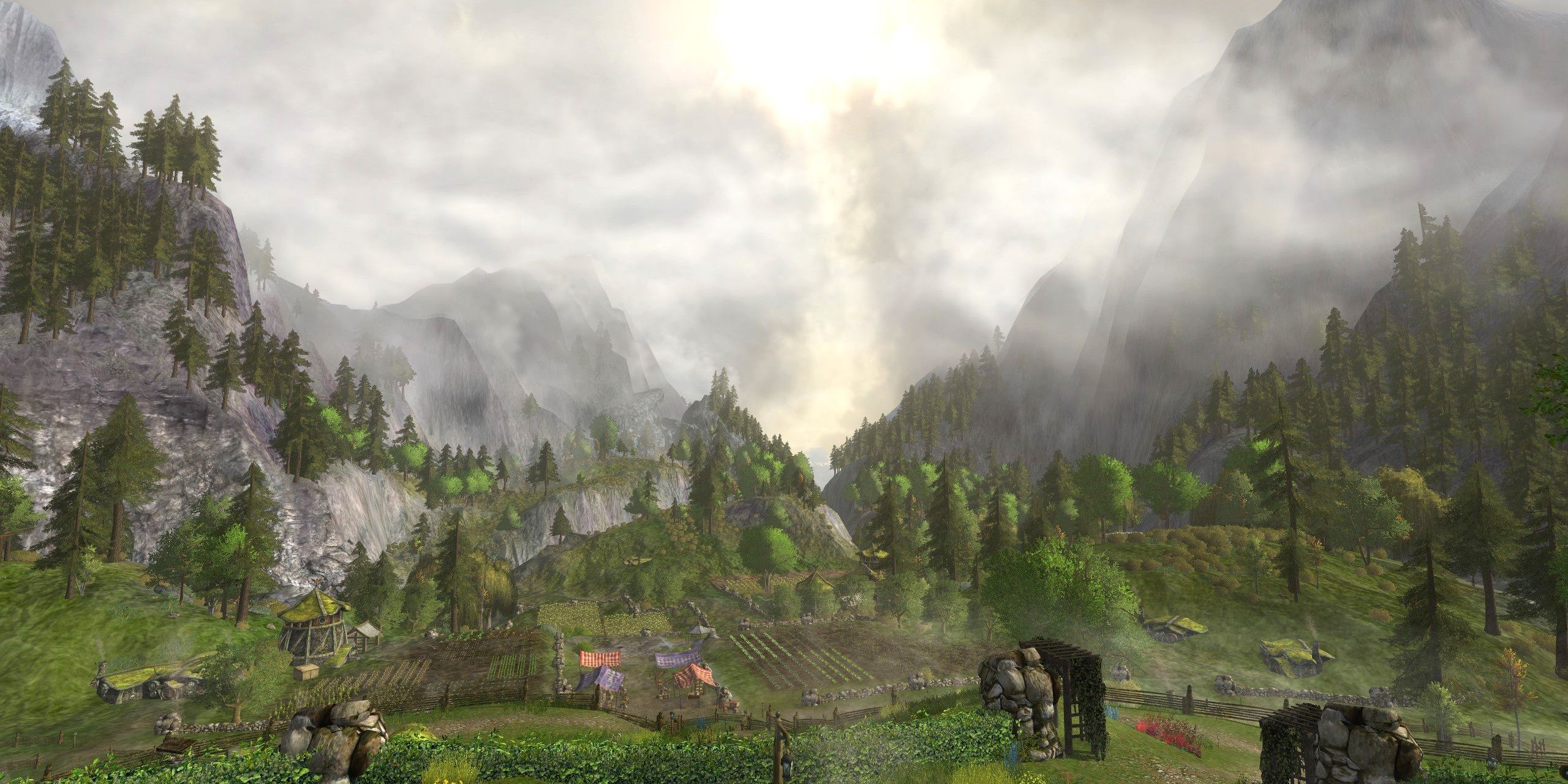 The sun breaking through the clouds over The shire in The Lord of the Rings Online