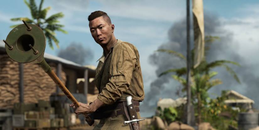 A Japanese soldier holds a lunge mine in the Pacific Islands in Battlefield 5