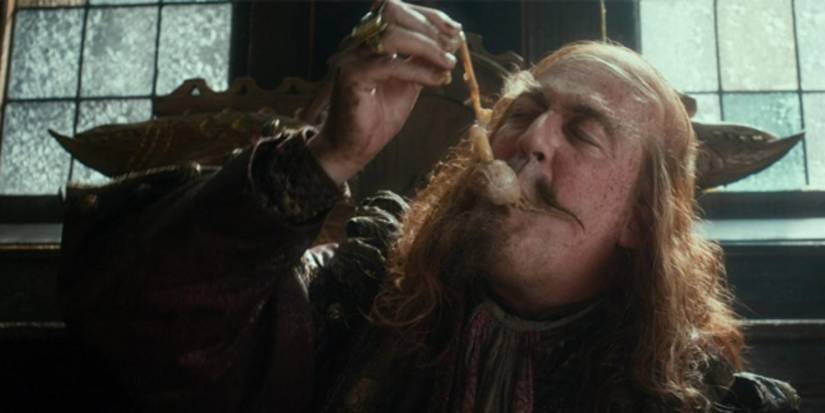 Master of Laketown eating