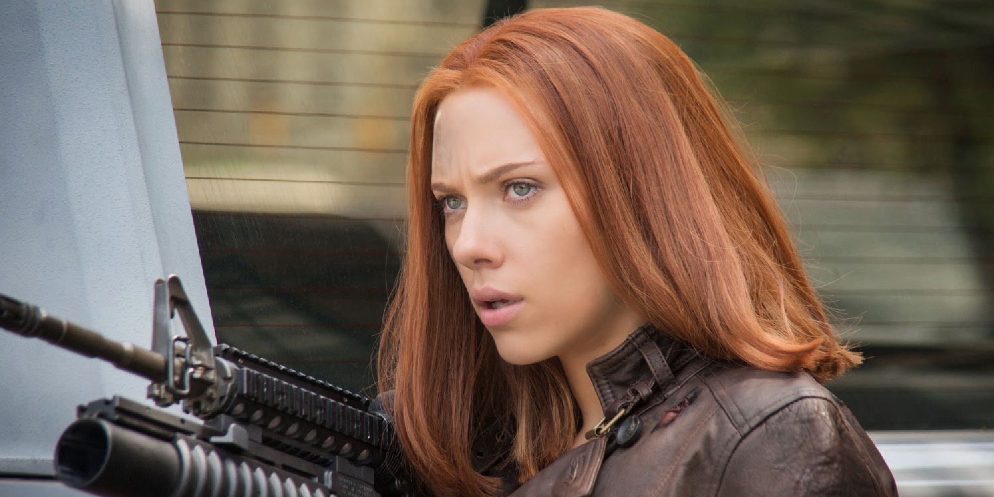 Natasha Romanoff with an assault rifle in Captain America: Winter Soldier