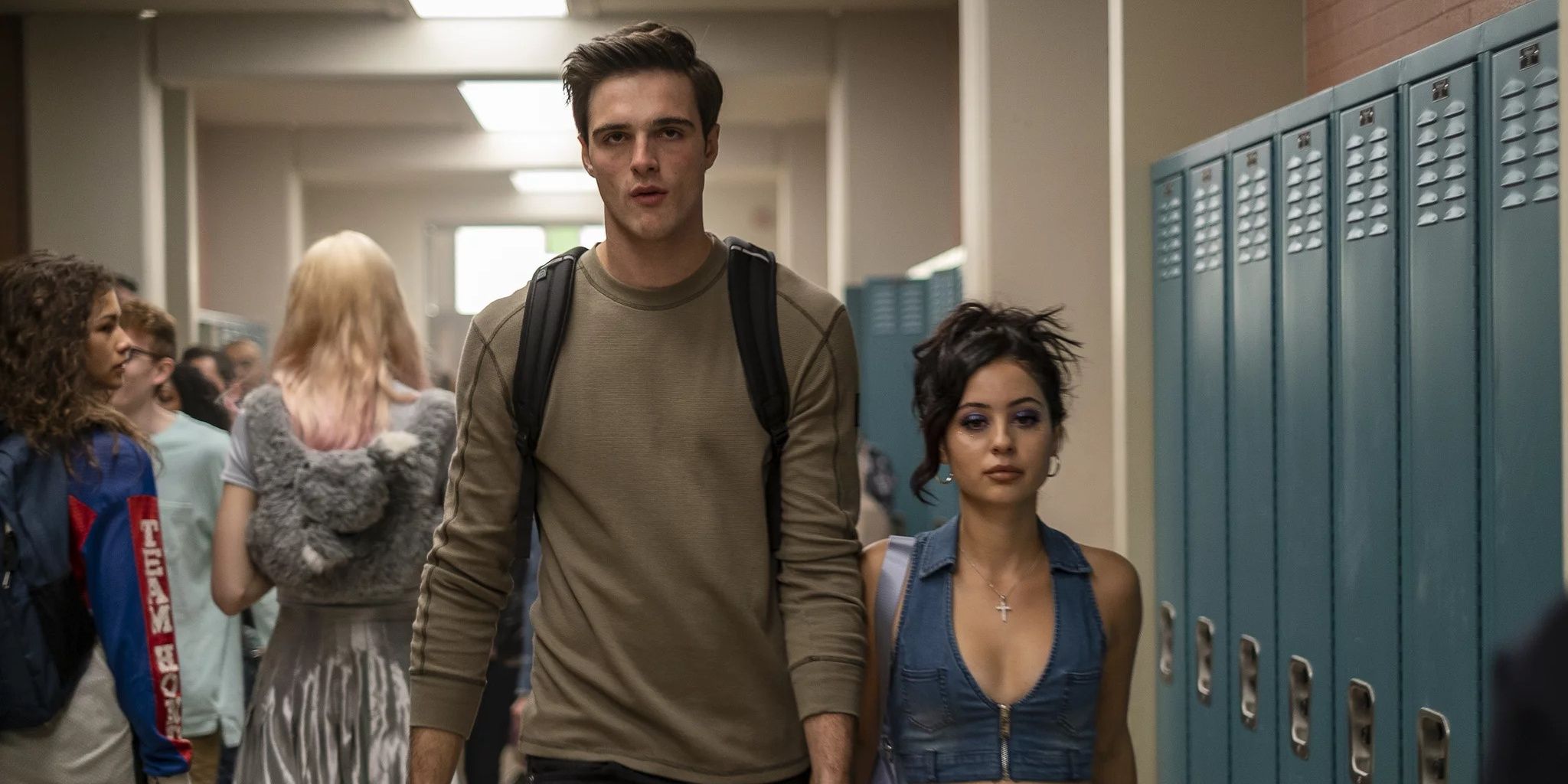 Nate and Maddy hold hands at school, from Euphoria