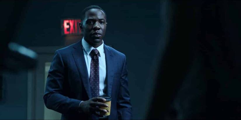 Trevor Evans holding coffee cup Ozark