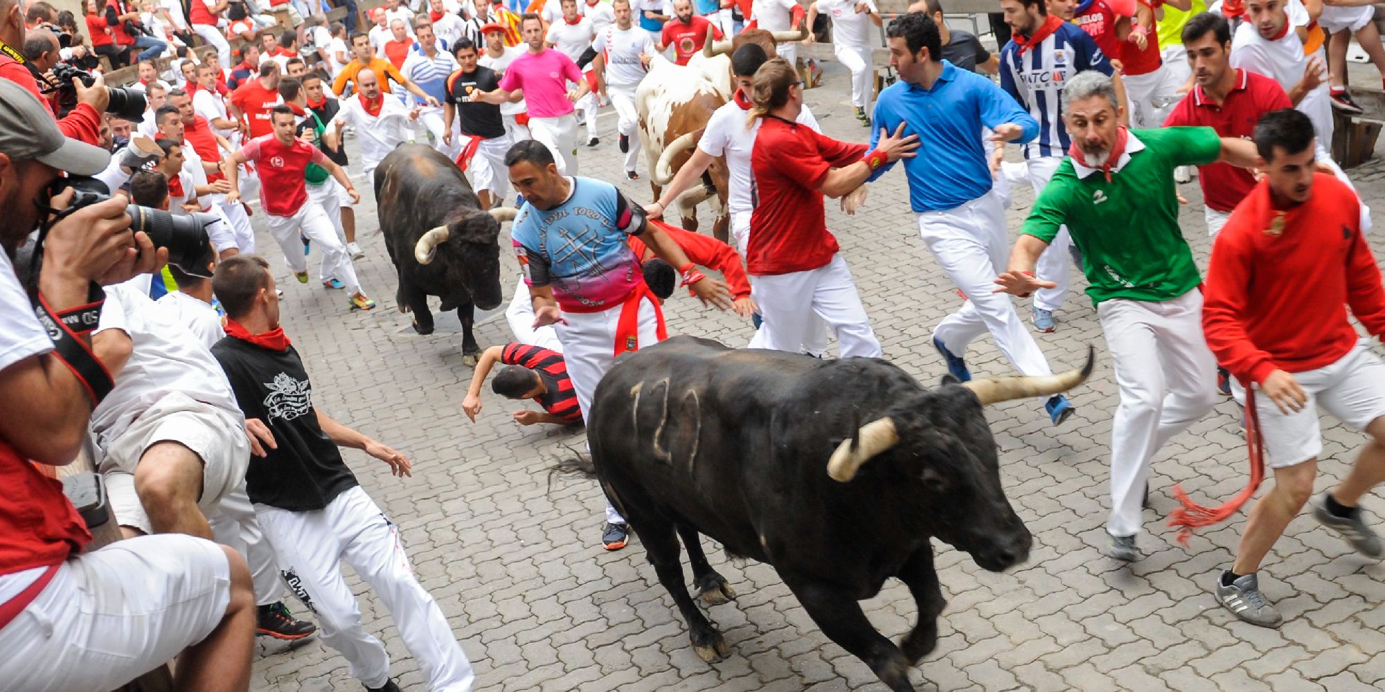 A running of the bulls festival taking place in Spain