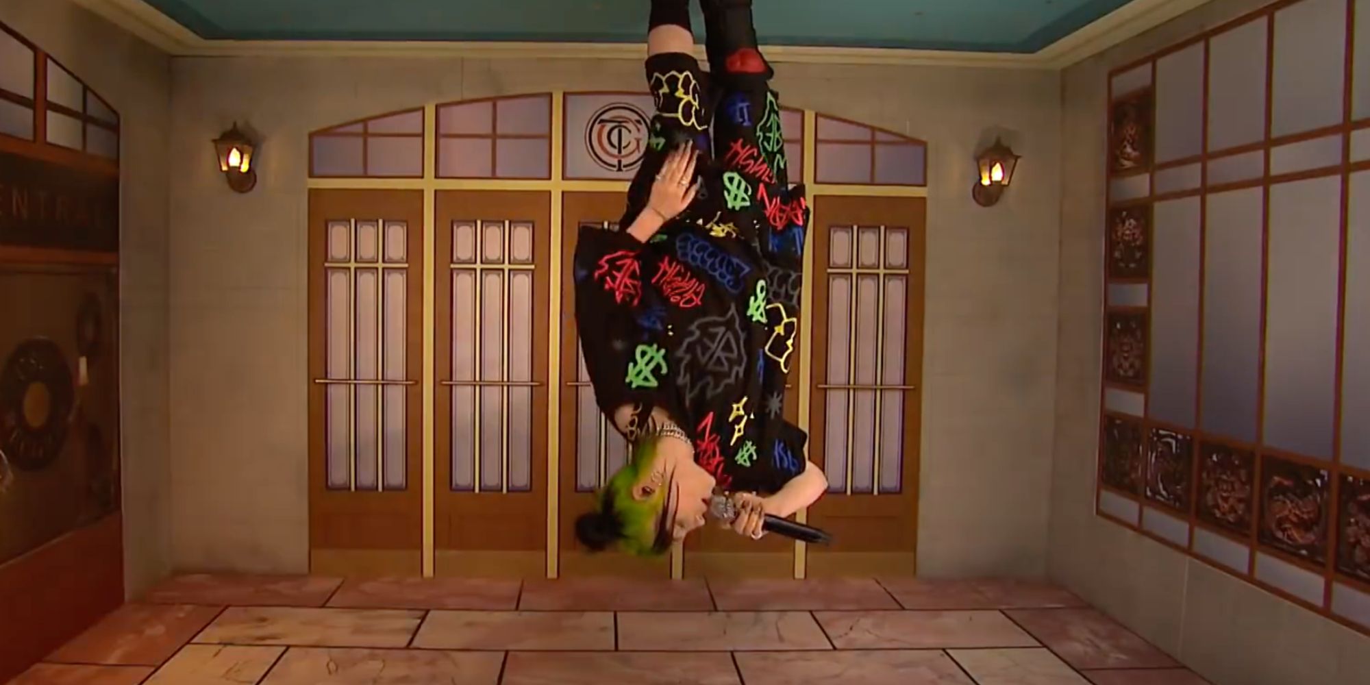 Billie Eilish performing "Bad Guy" while appearing upside-down on SNL in 2019