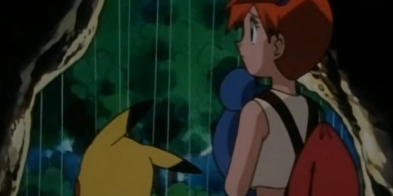 Pokemon Misty and Pikachu standing in rain