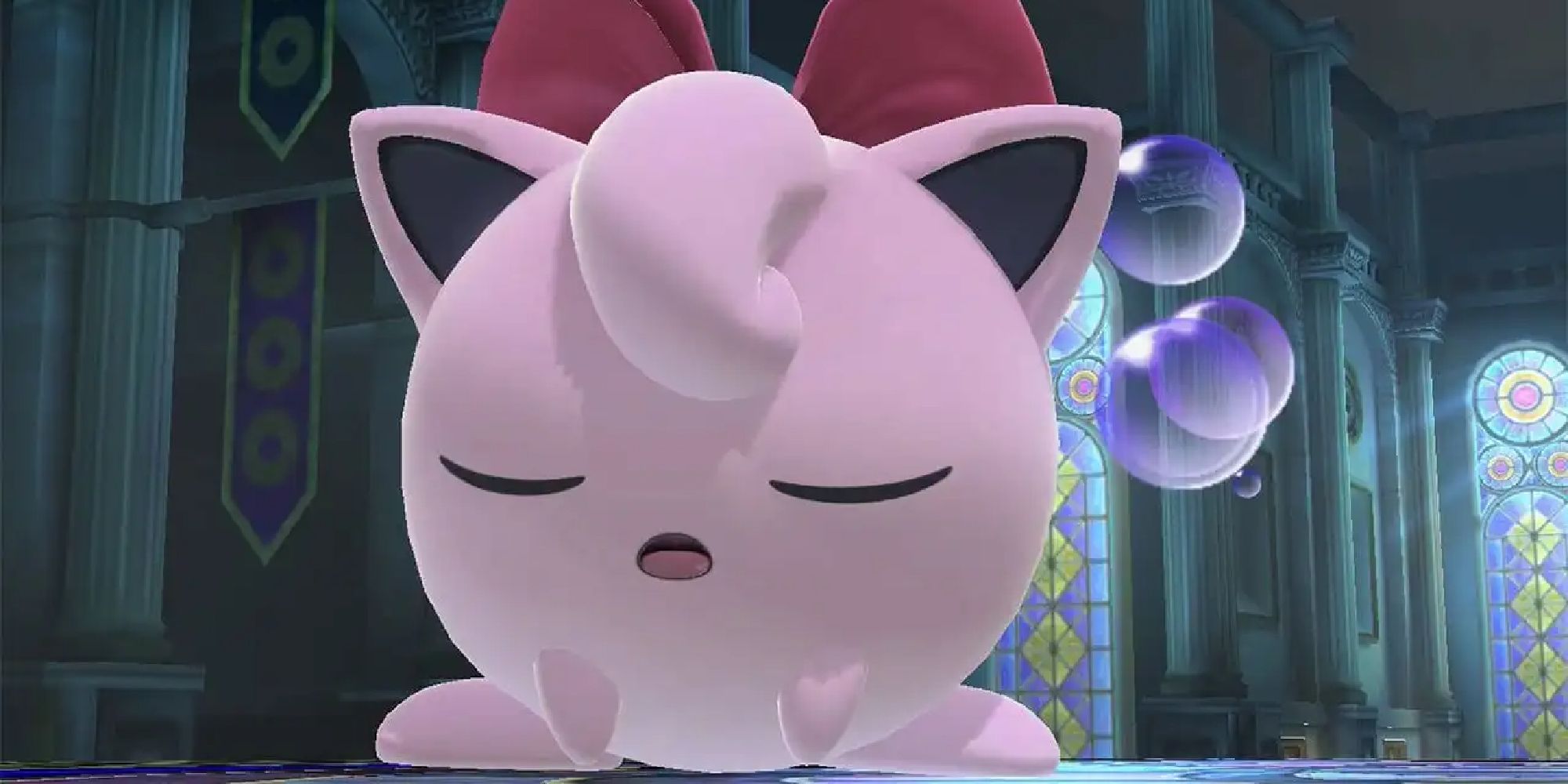 Jigglypuff with a bow sleeping
