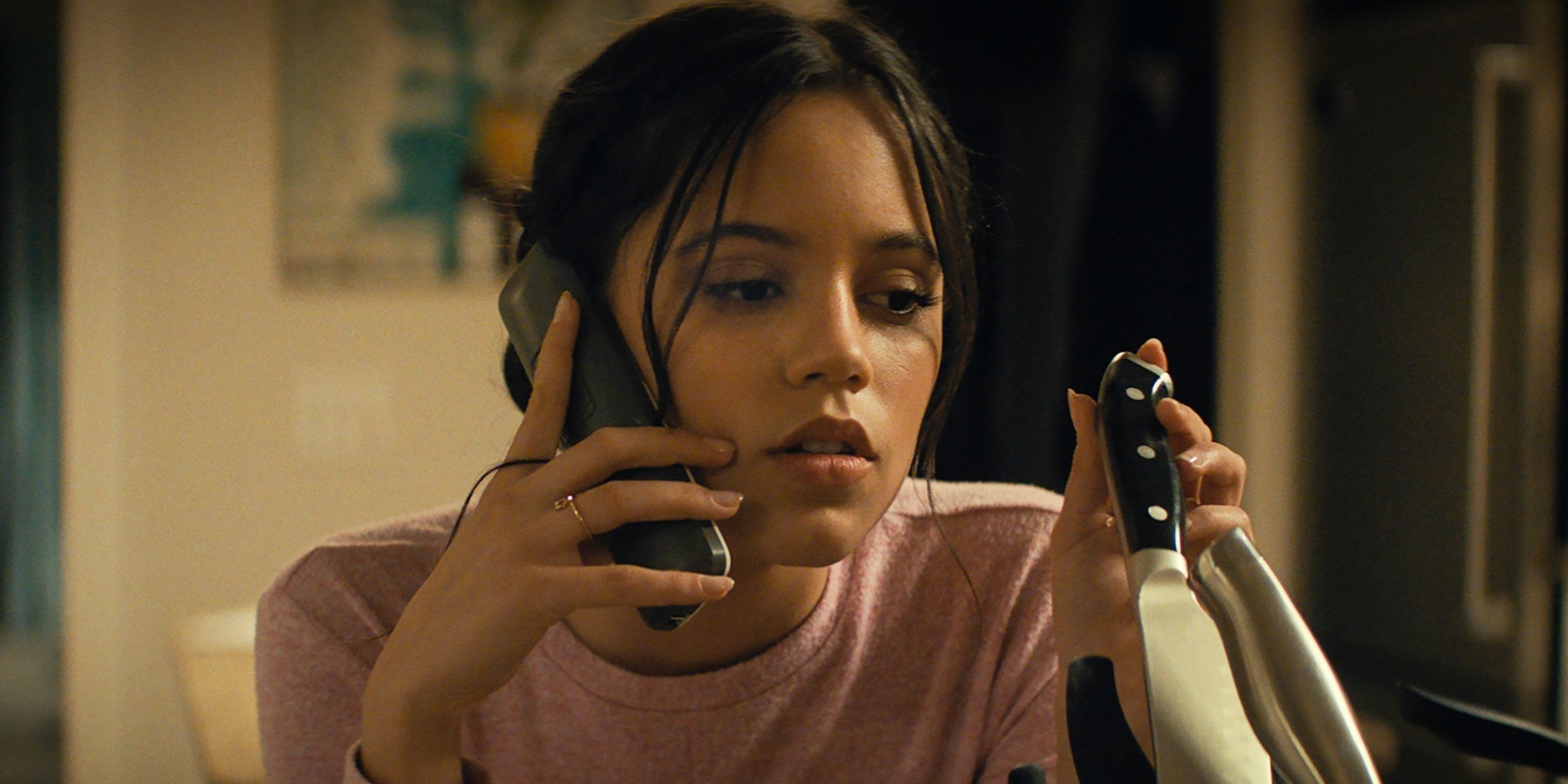 Tara speaking on the phone in Scream 2022