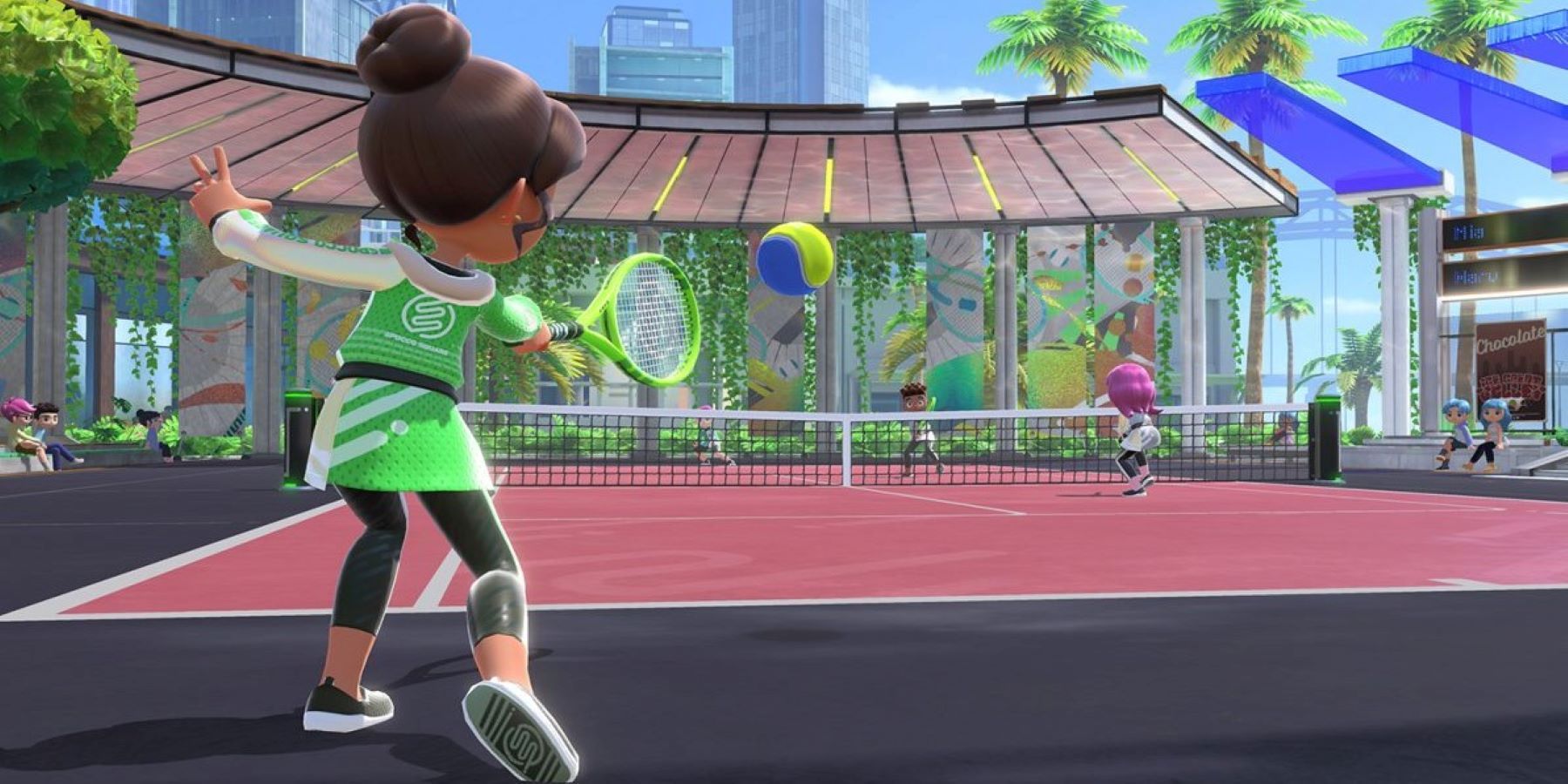 Товарищи по спорту играют в теннис на Nintendo Switch Sports