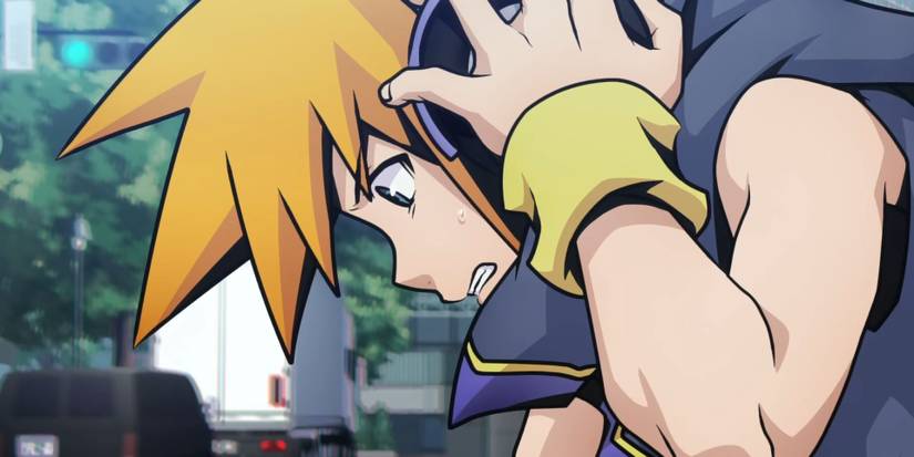 Neku in pain, grabbing his headphones