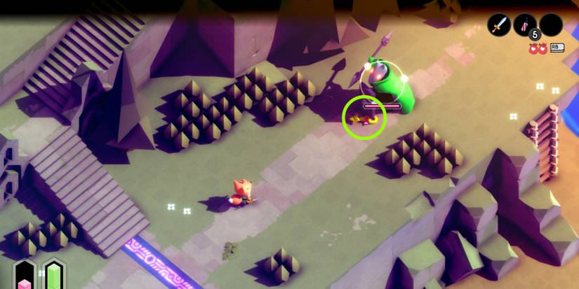 Tunic facing a green caped enemy holding both a large shield and a double-sided spear. a gold key at its feet is circled in green