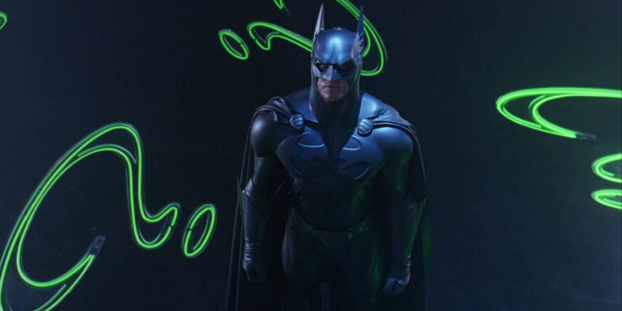 Val Kilmer's Batman standing in the Riddler's lair in Batman Forever