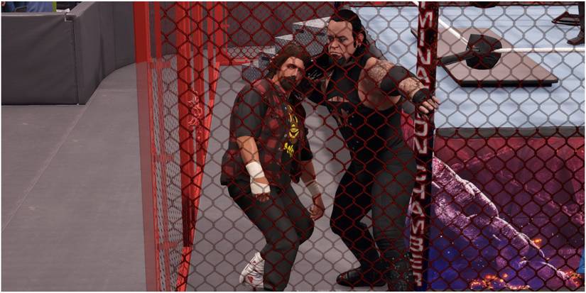  Undertaker smashing Foleys head into teh cage
