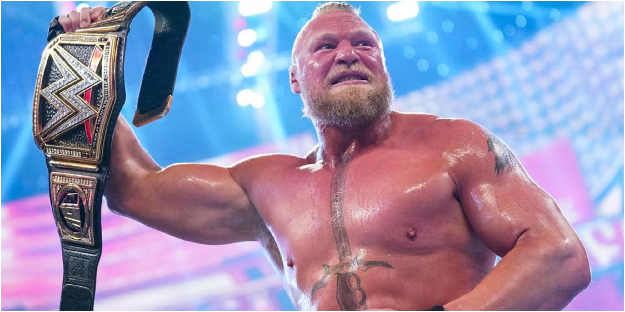 WWE Brock Lesnar raising the belt