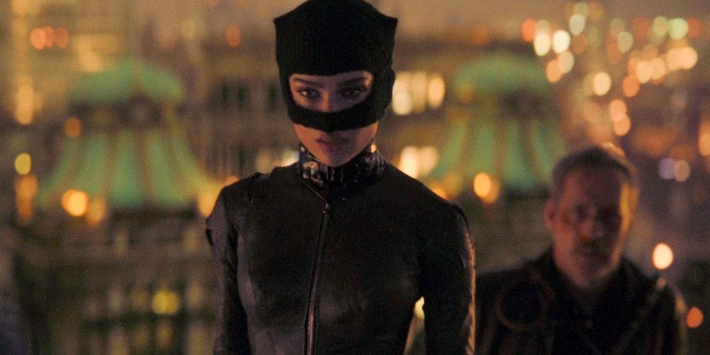 Zoe Kravitz as Catwoman interrogating a cop in The Batman