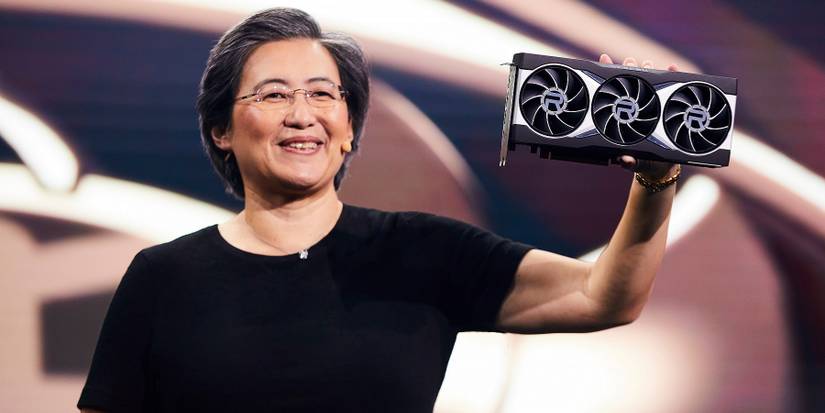 A photo of Lisa Su holding up an AMD Radeon graphics card.