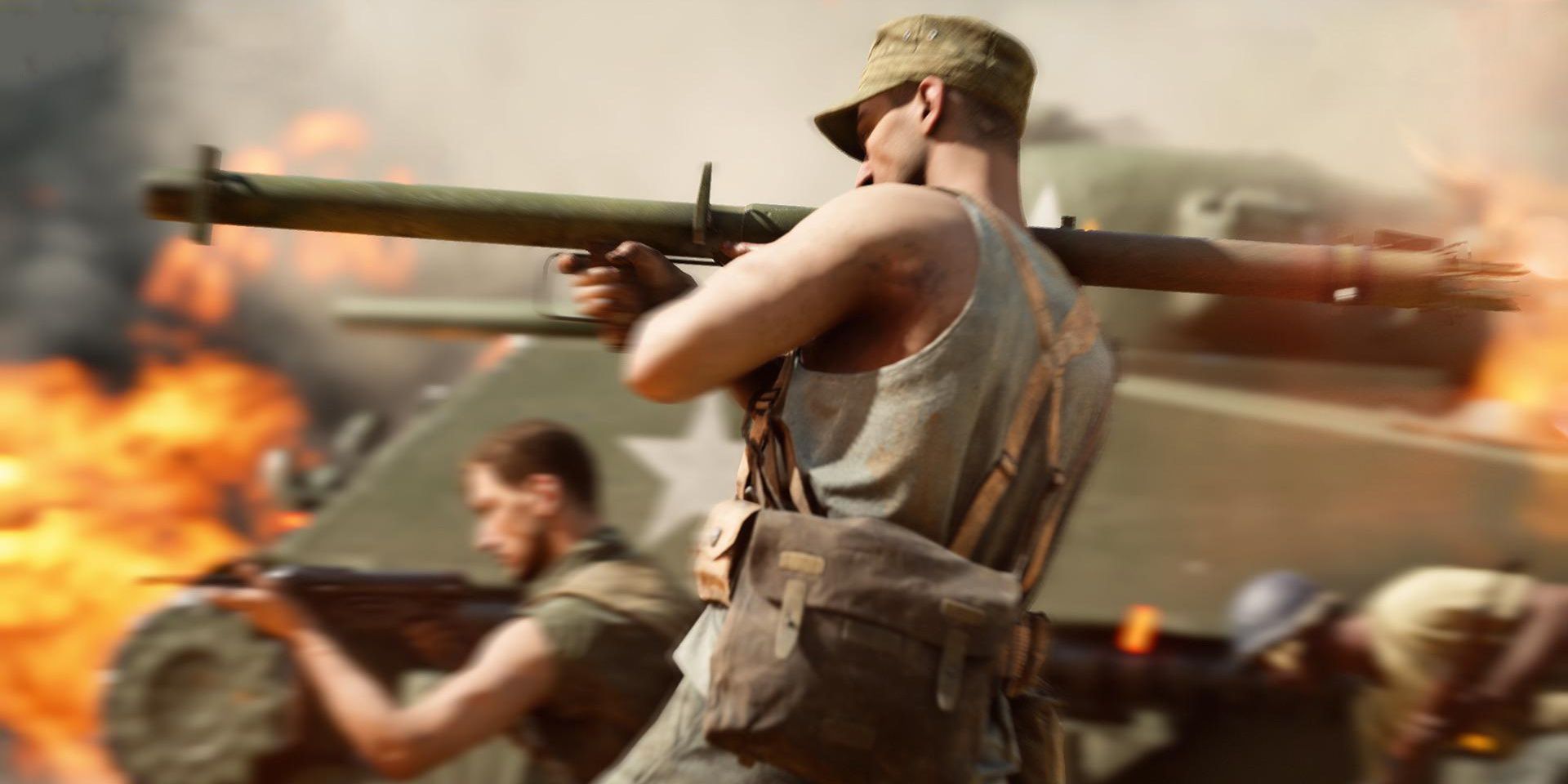 A US soldier fires a bazooka in front of a tank and other soldiers in Battlefield 5