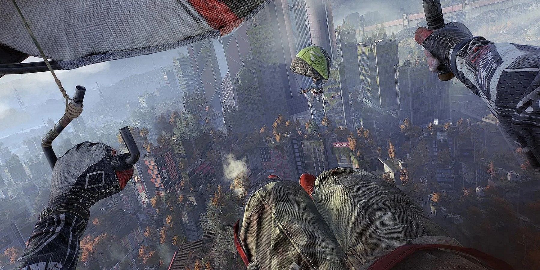 Image from Dying Light 2 showing the player parachuting down from high up. 