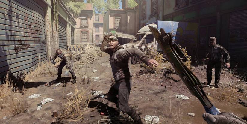 Screenshot from Dying Light 2 showing the player about to be attacked in an alleyway.