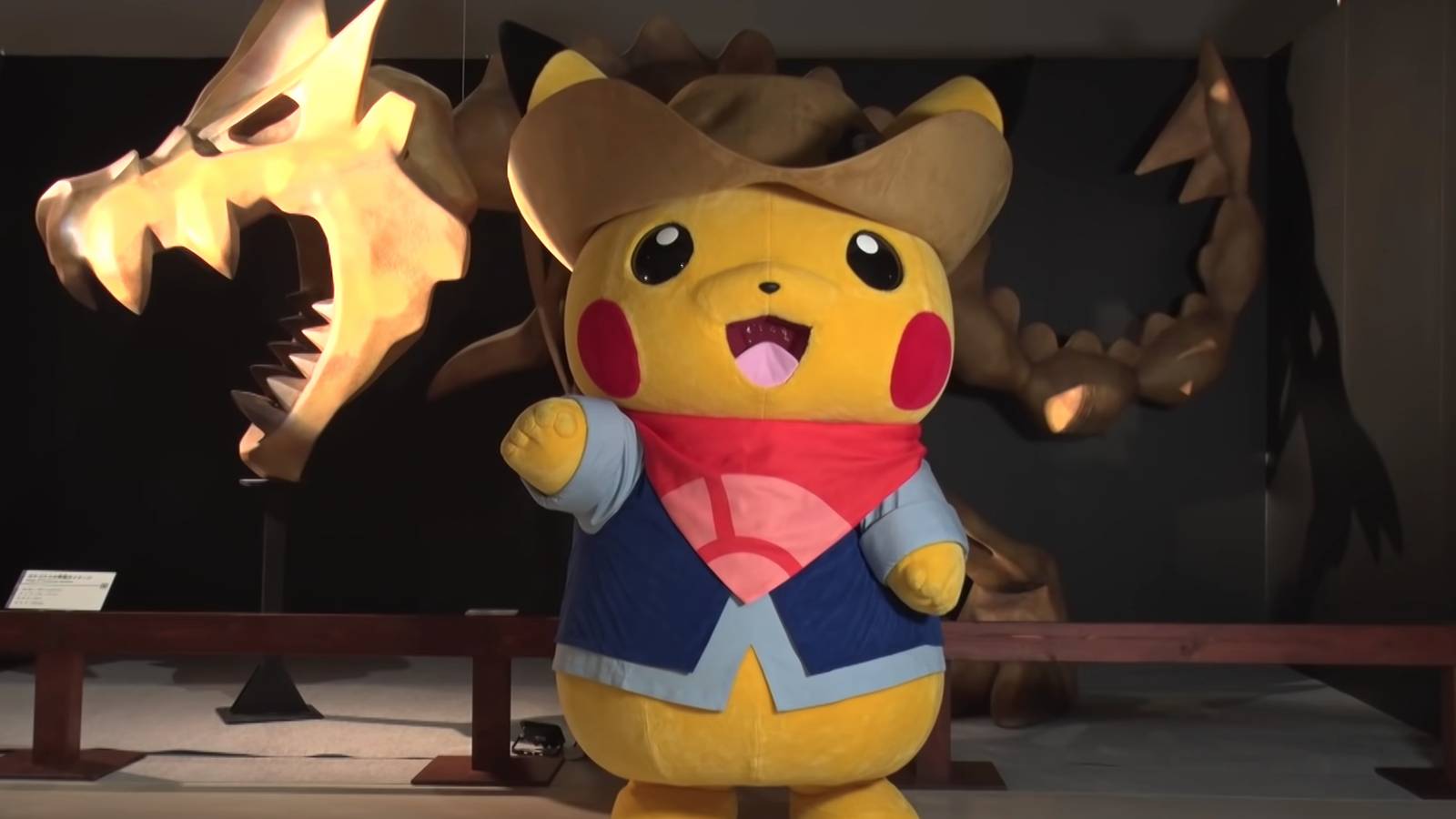 excavator-pikachu-next-to-tyrantrum-fossil