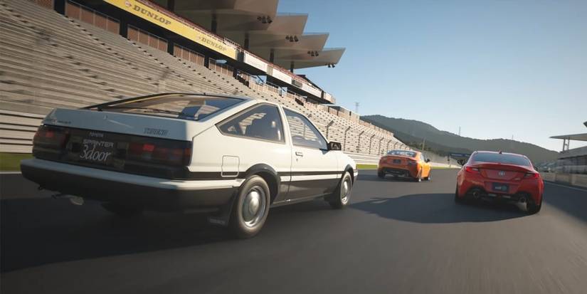 grand turismo 7 3 cars racing with back towards the camera Cropped