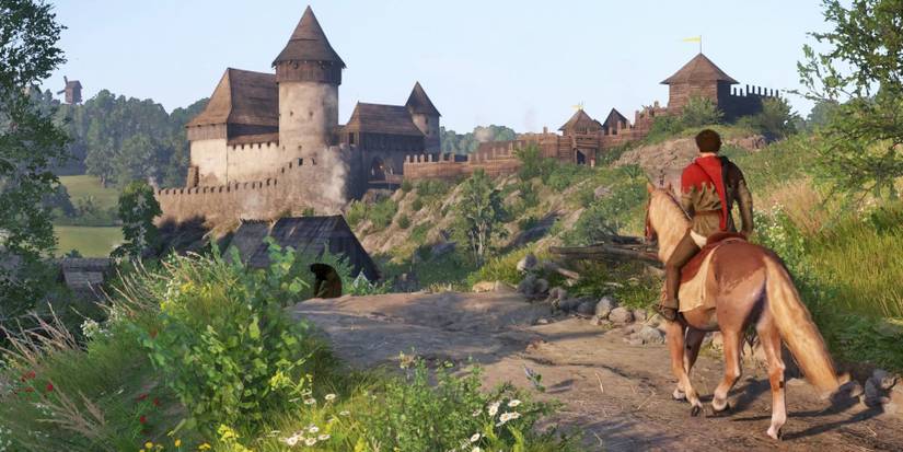 A man riding a horse on a road to a castle in Kingdom Come: Deliverance