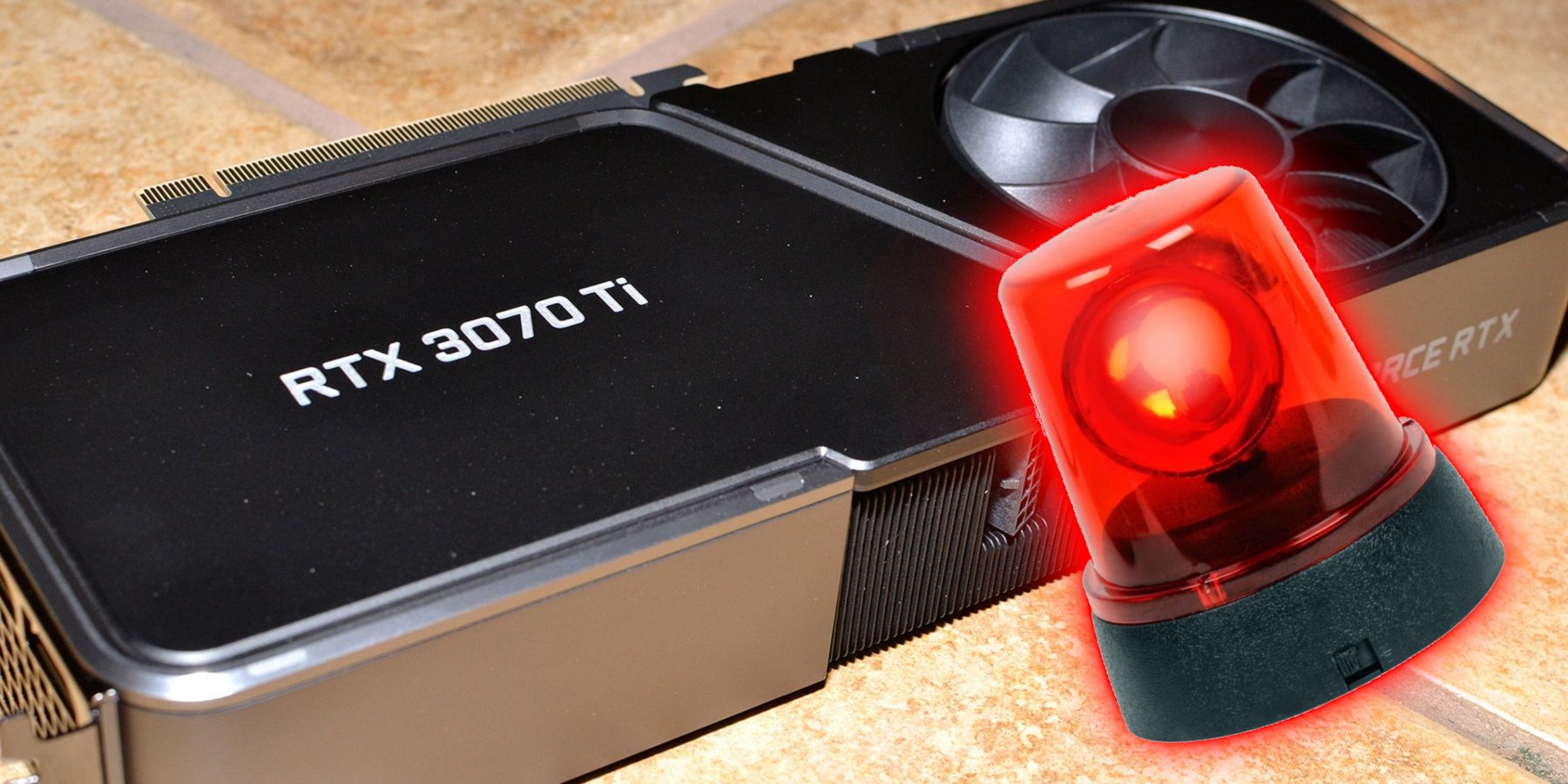Image of an Nvidia RTX 3070 Ti with a red police siren in front of it.