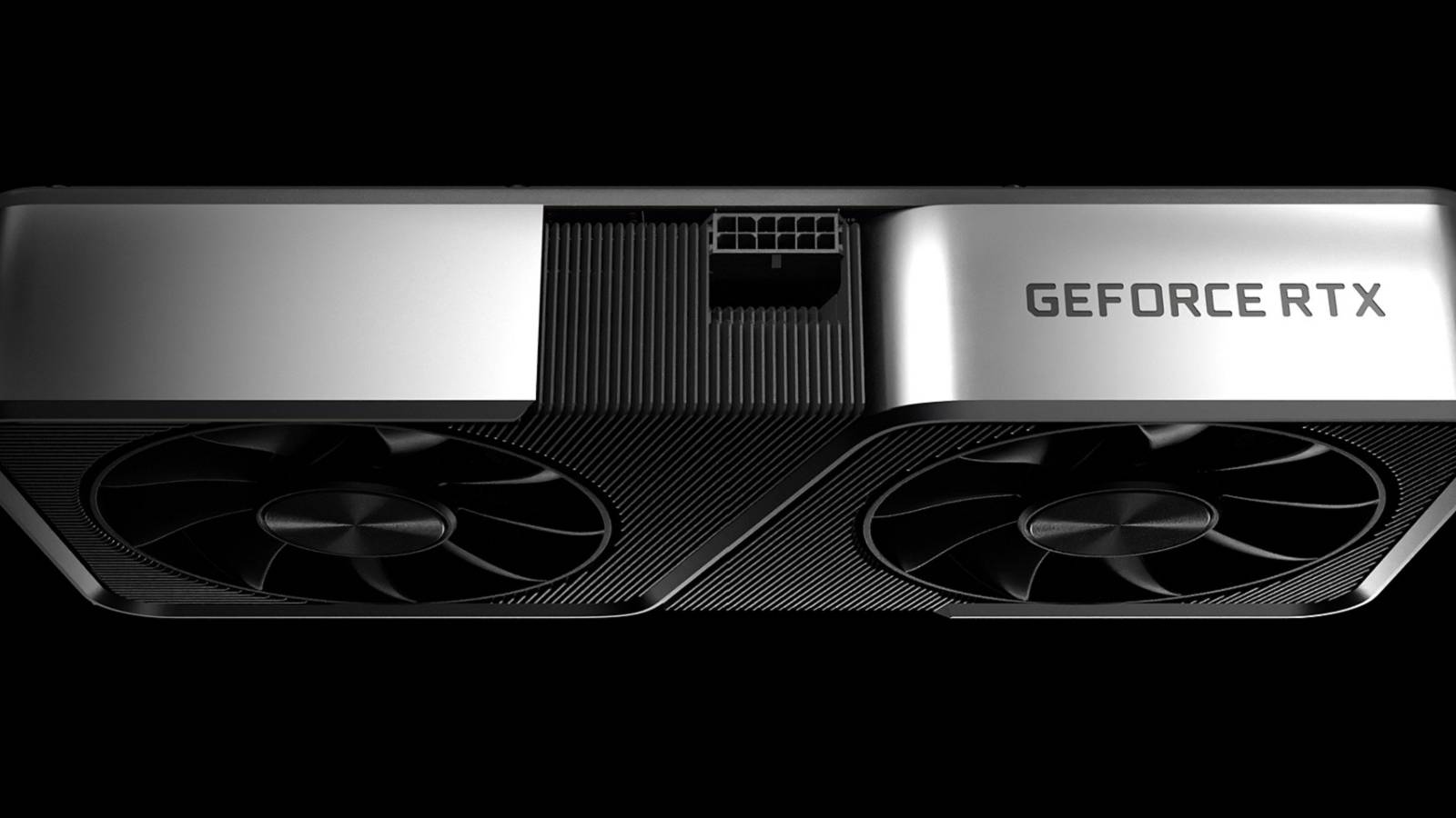 Top down photo of an Nvidia RTX graphics card on a black background.