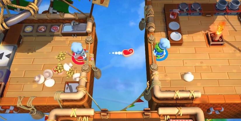overcooked 2 player throwing meat on hot air balloon kitchen
