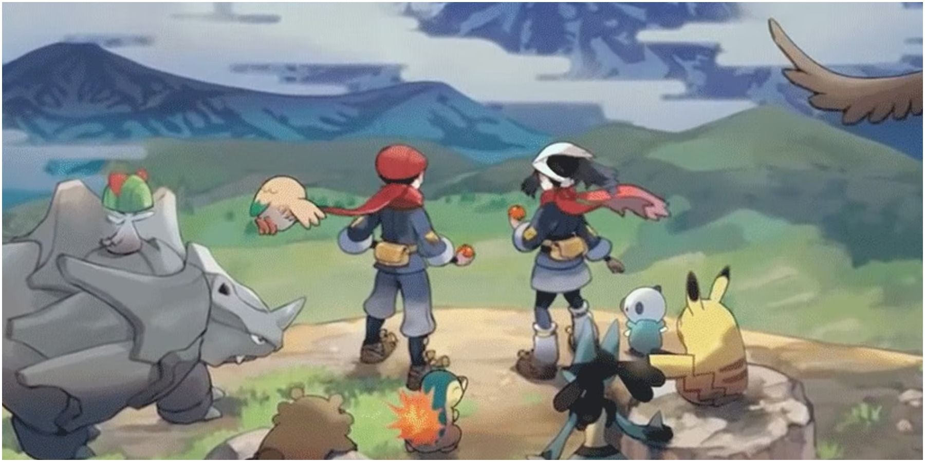 Protagonists looking at mountains with Pokemon.
