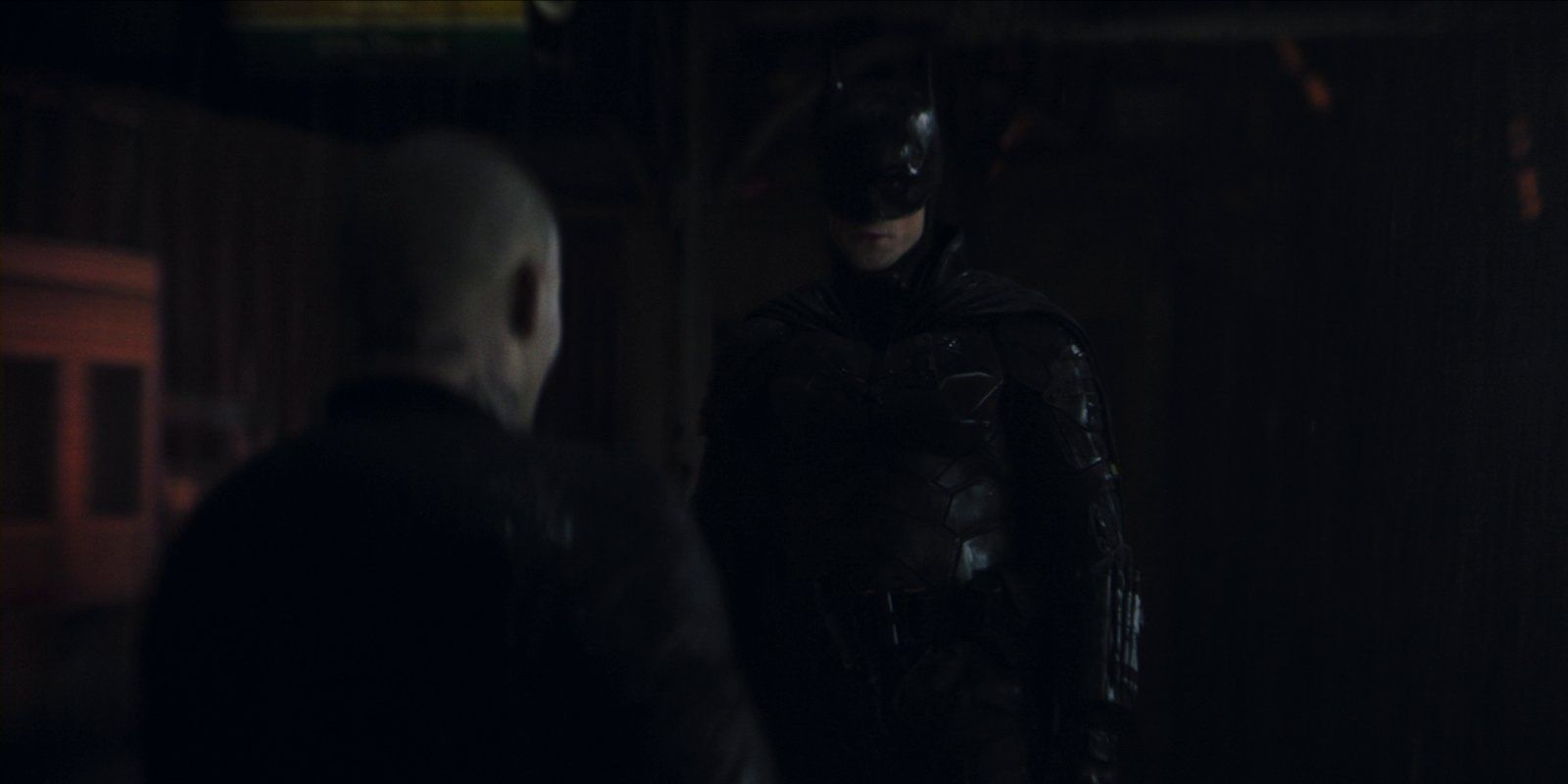 A street thug confronts Batman in The Batman