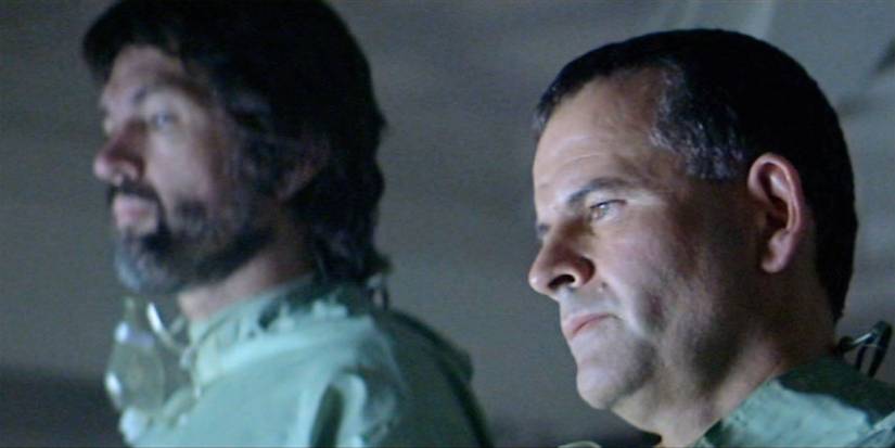 Ash and Dallas looking at something off screen