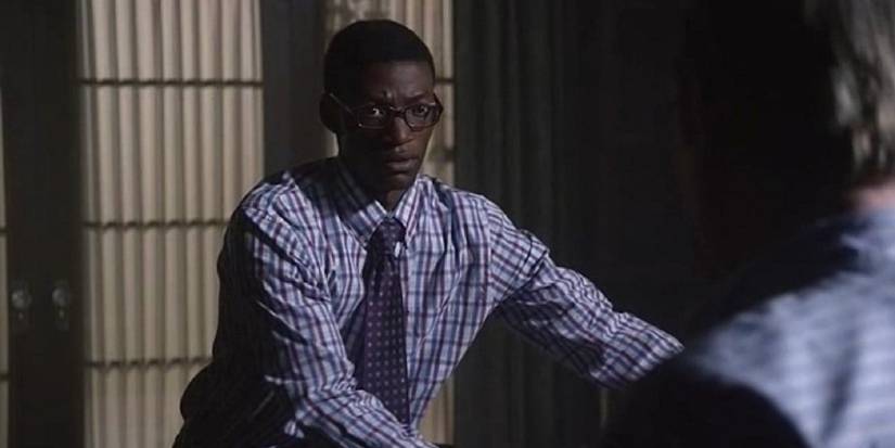 Ernesto in Chuck's house talking to Jimmy, looking concerned