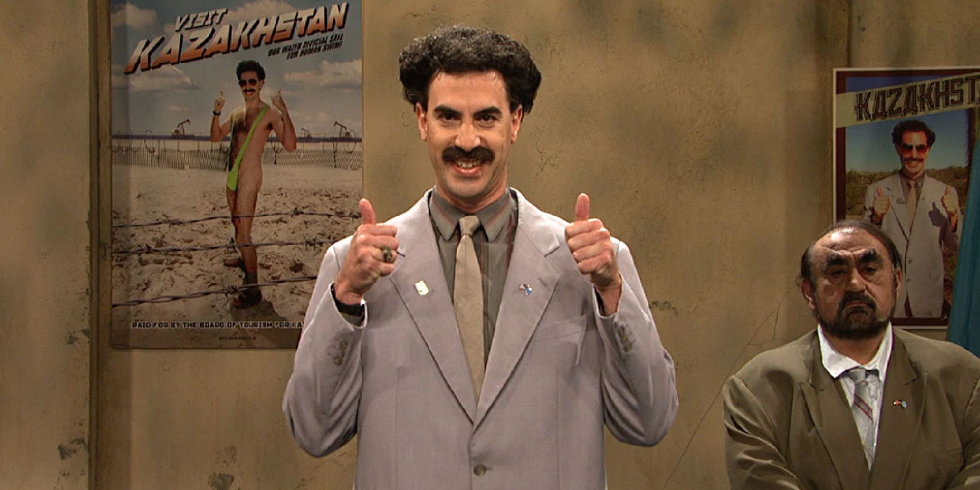 Sacha Baron Cohen appearing as Borat in an SNL cold open alongside Ken Davitian