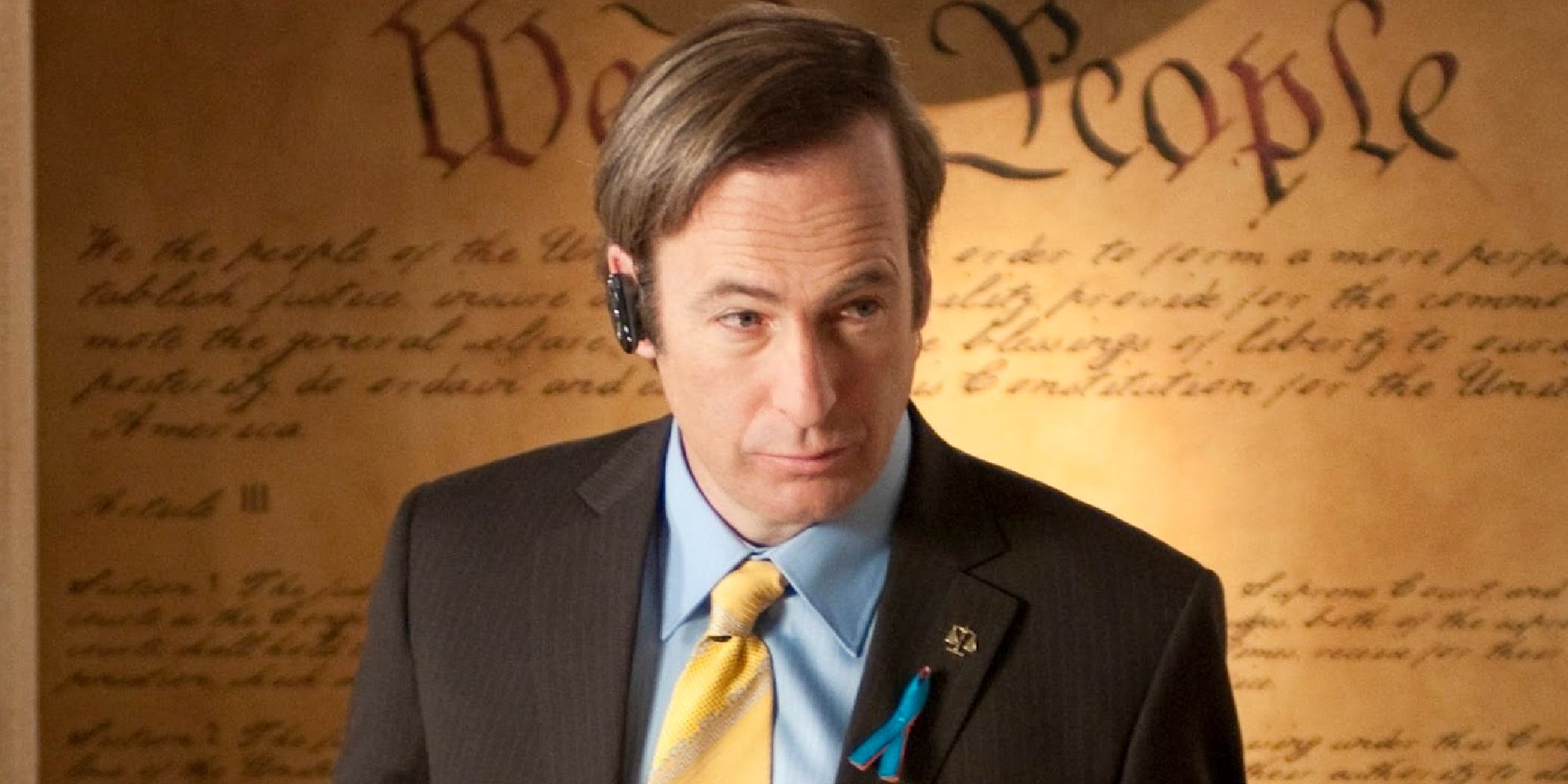 Saul Goodman with his bluetooth speaker in his office from Breaking Bad