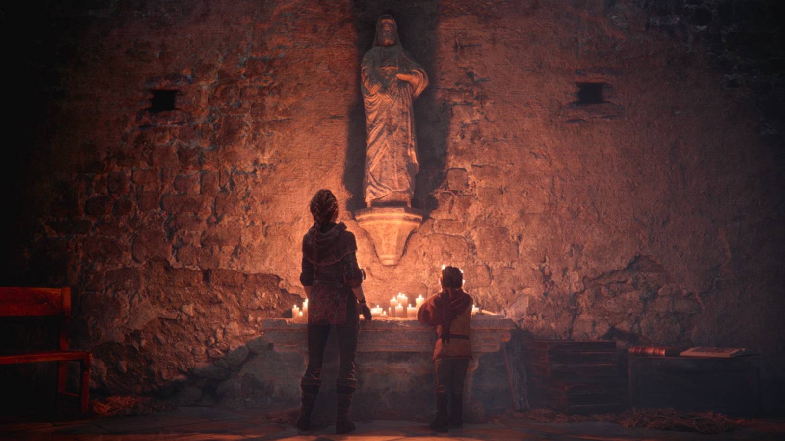 A Plague Tale Innocence Amicia and Hugo standing in a church