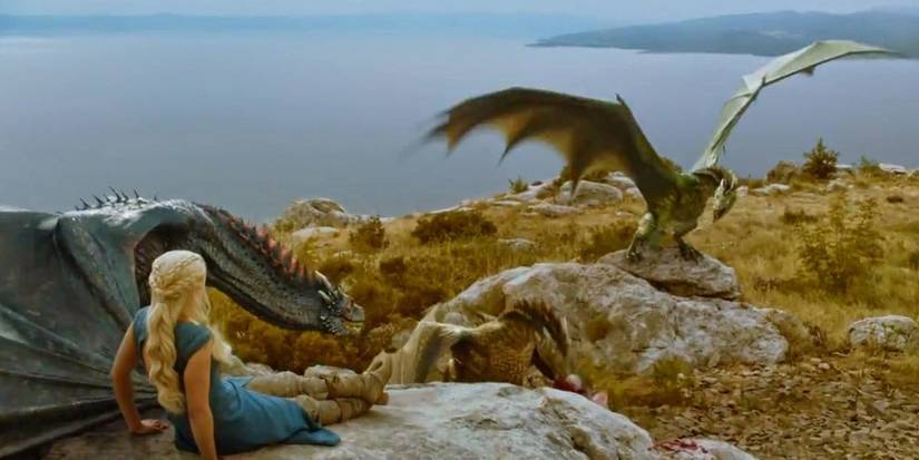 Daenerys hanging out with her dragons in Game of Thrones.