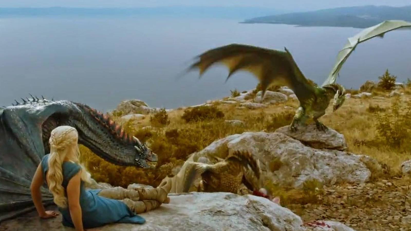 Daenerys hanging out with her dragons in Game of Thrones.