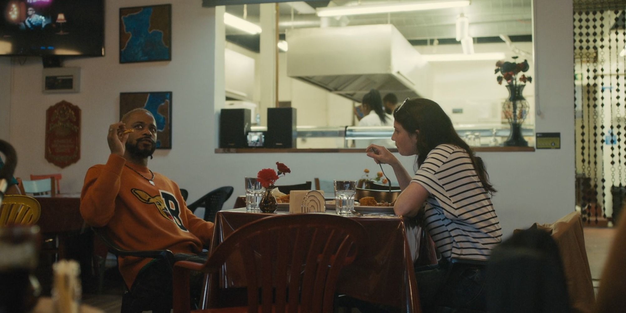 Darius eating in Nigerian restaurant in Atlanta 