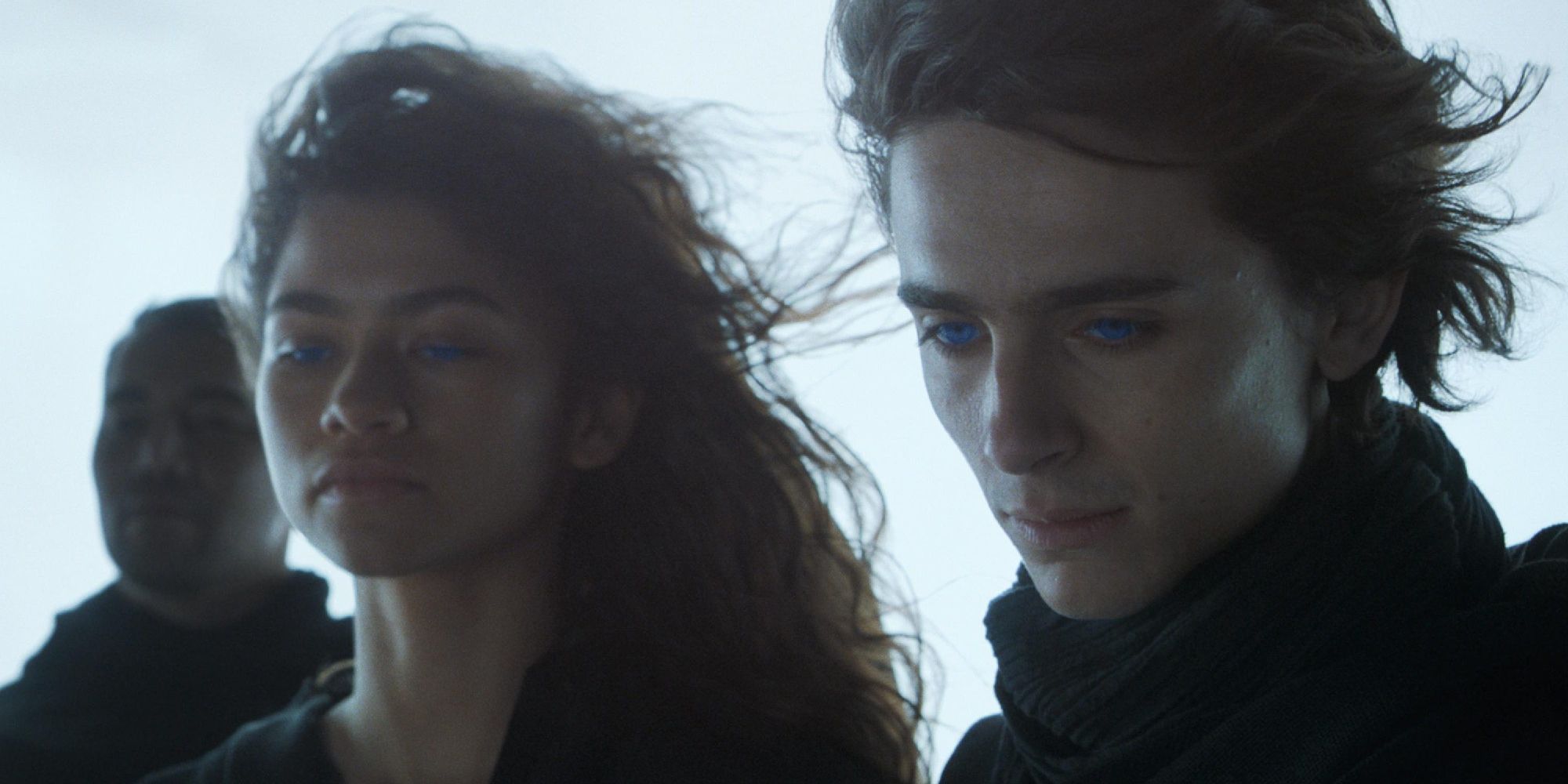 Timothee Chalemet and Zendaya with glowing blue eyes in Dune