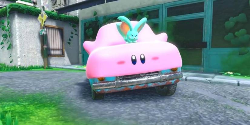 Car Mouth Kirby in an early Kirby and the Forgotten Land level with Elfilin riding on top