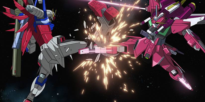 Freedom Gundam of the Earth Alliance and Justice of the ZAFT in combat