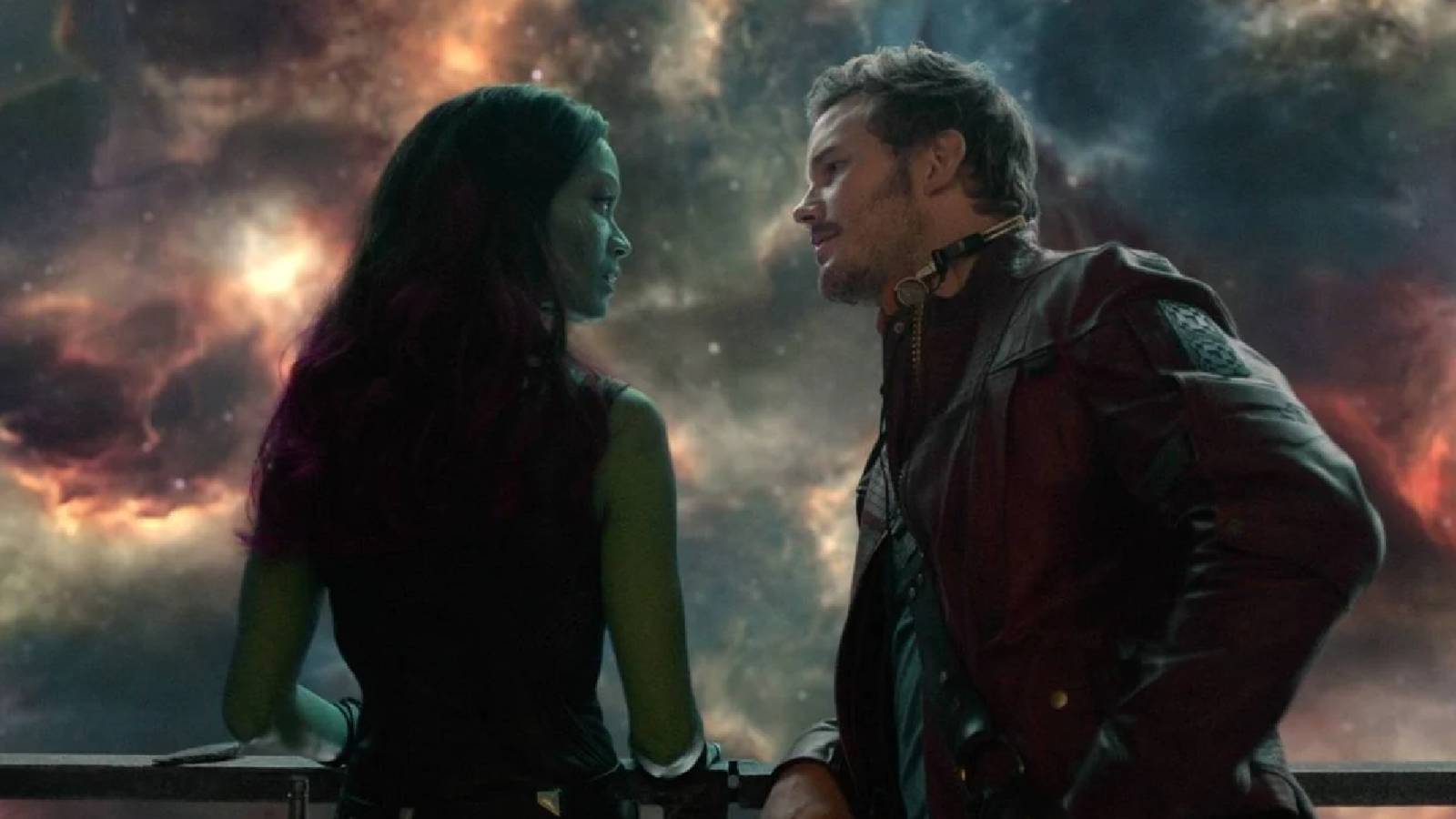 Peter Quill flirting with Gamora on a balcony in the first Guardians of the Galaxy