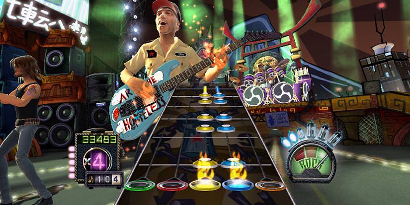 A game of Guitar Hero III showing a long line of yellow and blue notes coming up