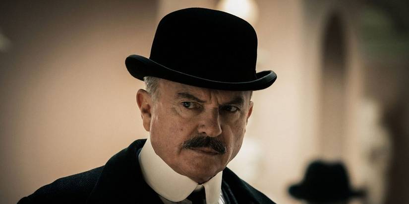 Inspector Campbell wearing a hat