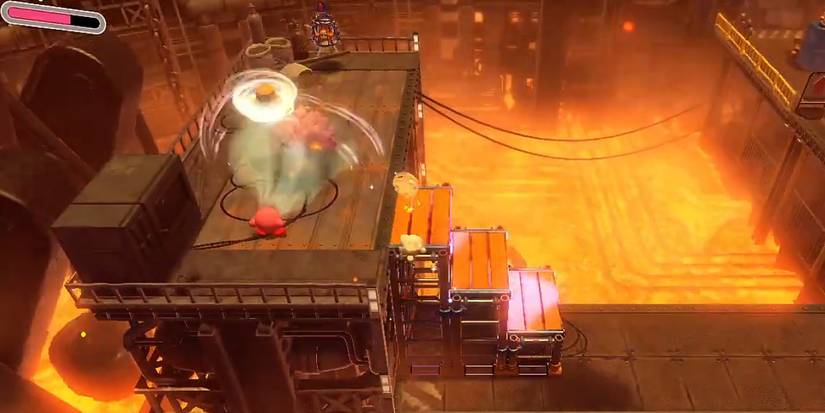 Kirby and the Forgotten Land consume spike and tornado enemies in industrial lava stage