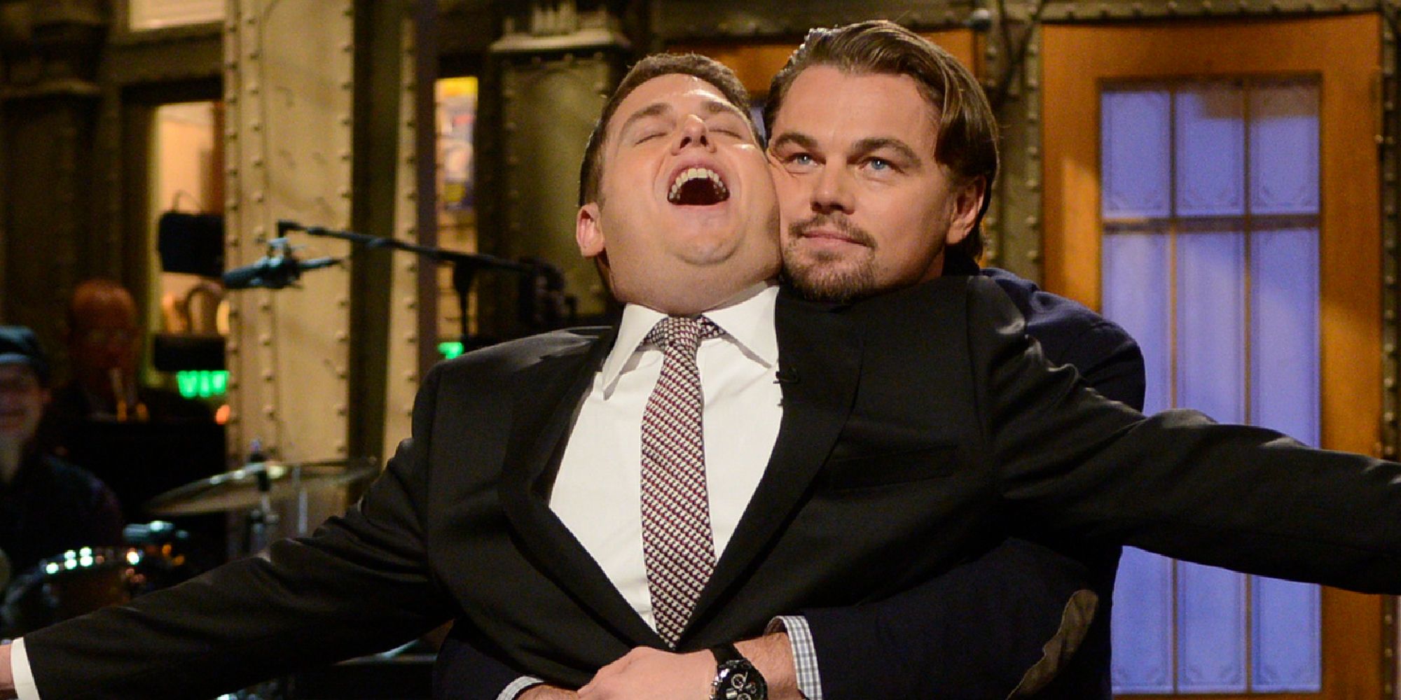Leonardo DiCaprio re-enacting the Titanic hug with Jonah Hill in an SNL monologue