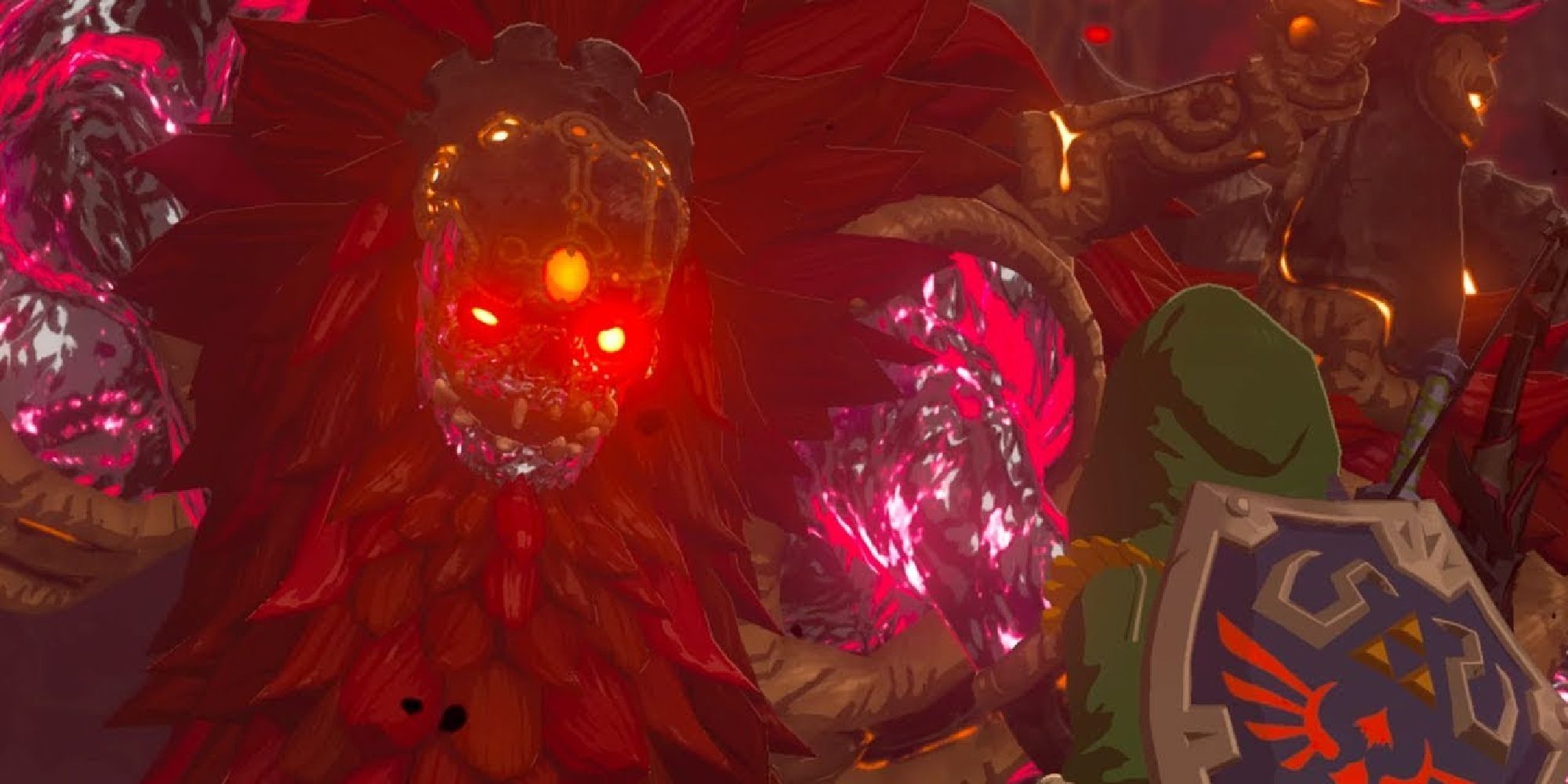 A green hooded Link stands before Calamity Ganon in BOTW
